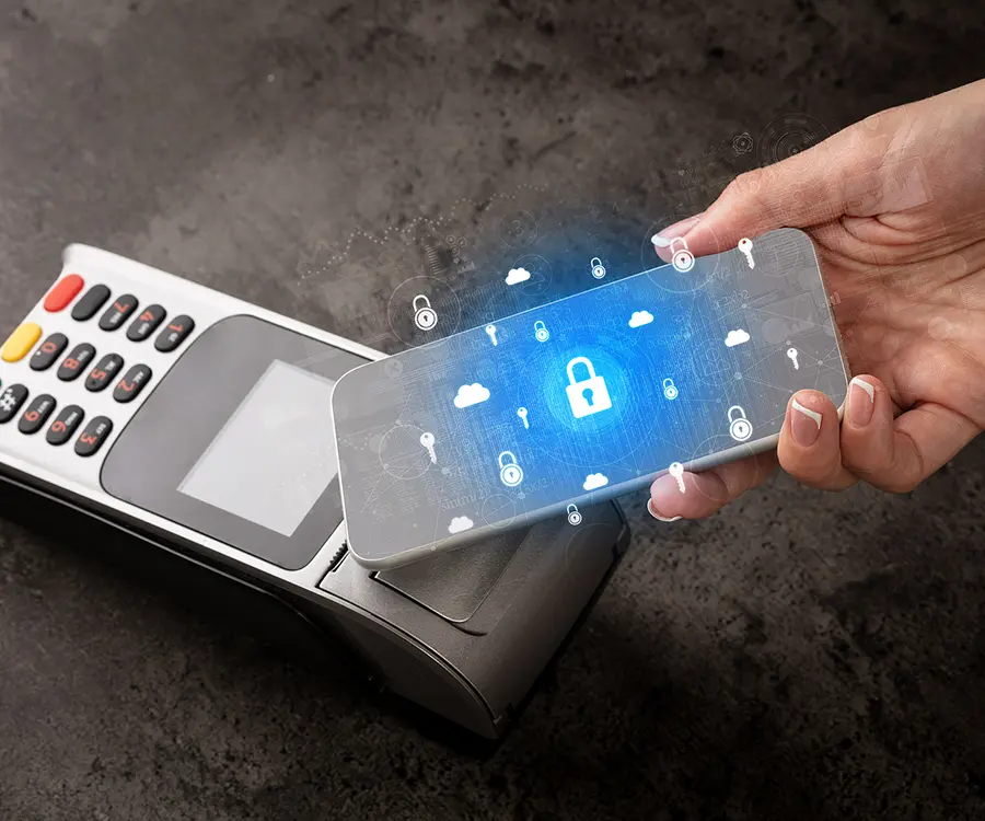 Image of a person paying with a smartphone